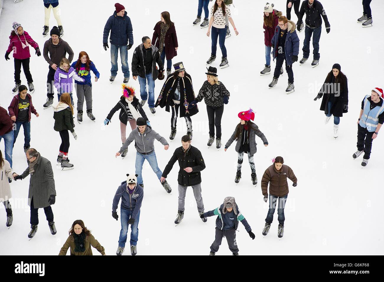 Skaters on the winter ice rink at Somerset House, London, as they wear ...