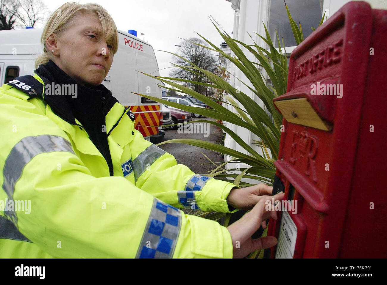 A police woman seals the post box on the Dunn Cow in Sedgefield, Tony Blair's North East constituency in County Durham, with roads across the village shut until 5pm and the owners of vehicles parked on the streets being asked to move them. Mr Bush is to visit Sedgefield tomorrow and local police have been putting the finishing touches to a 1 million security operation ahead of the event. Stock Photo