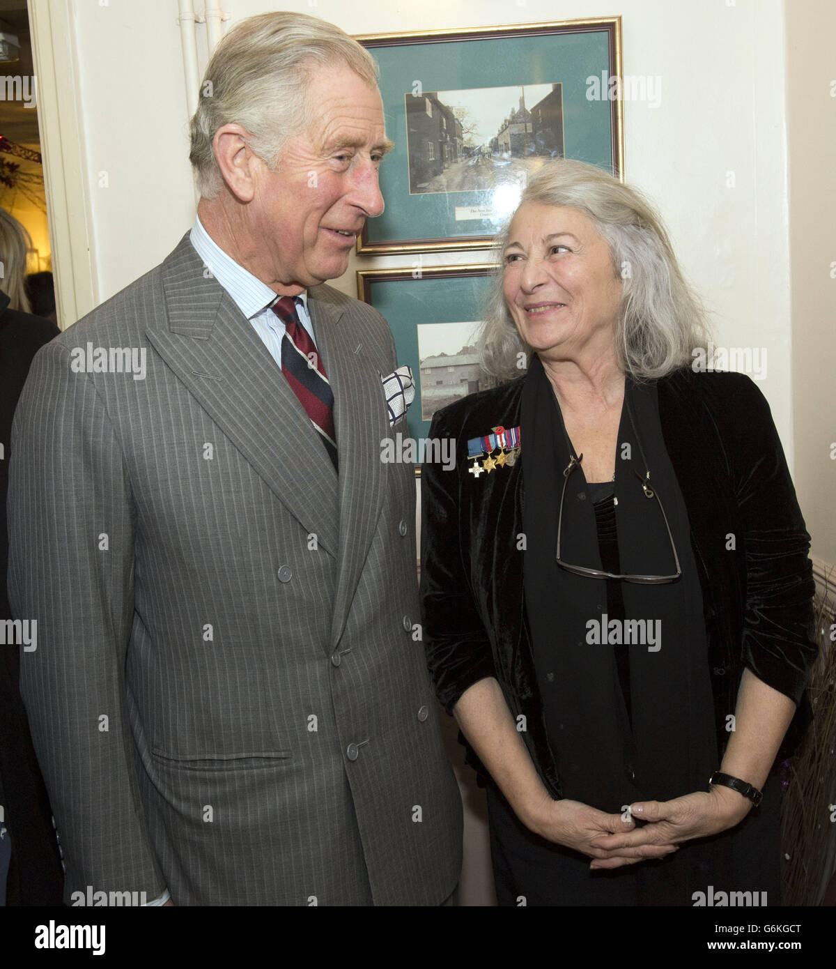 The Prince of Wales meets Tania Szabo (right), daughter of Violette Szabo, at a Service of