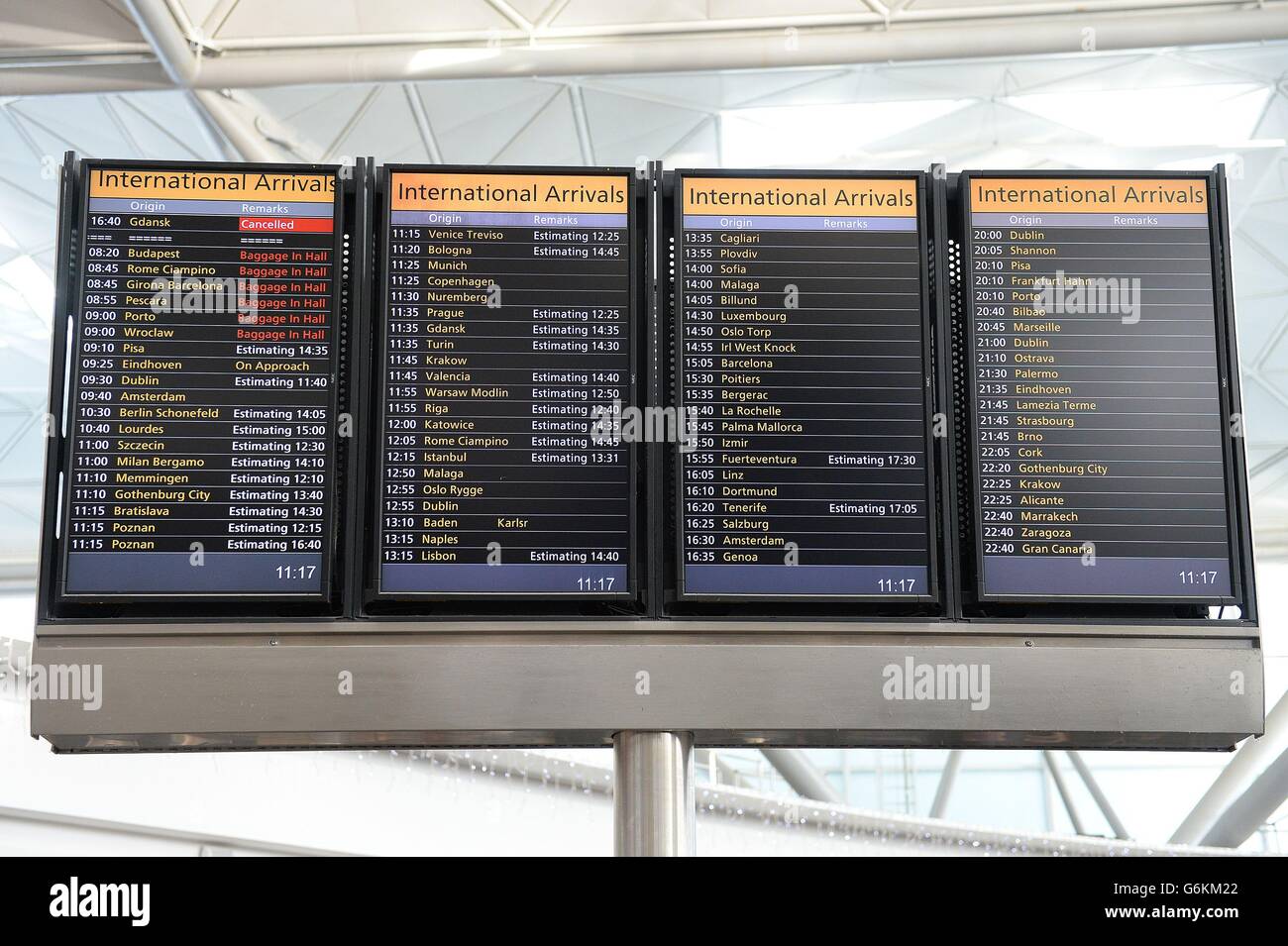 A flight information board at Stansted Airport, Essex, after a