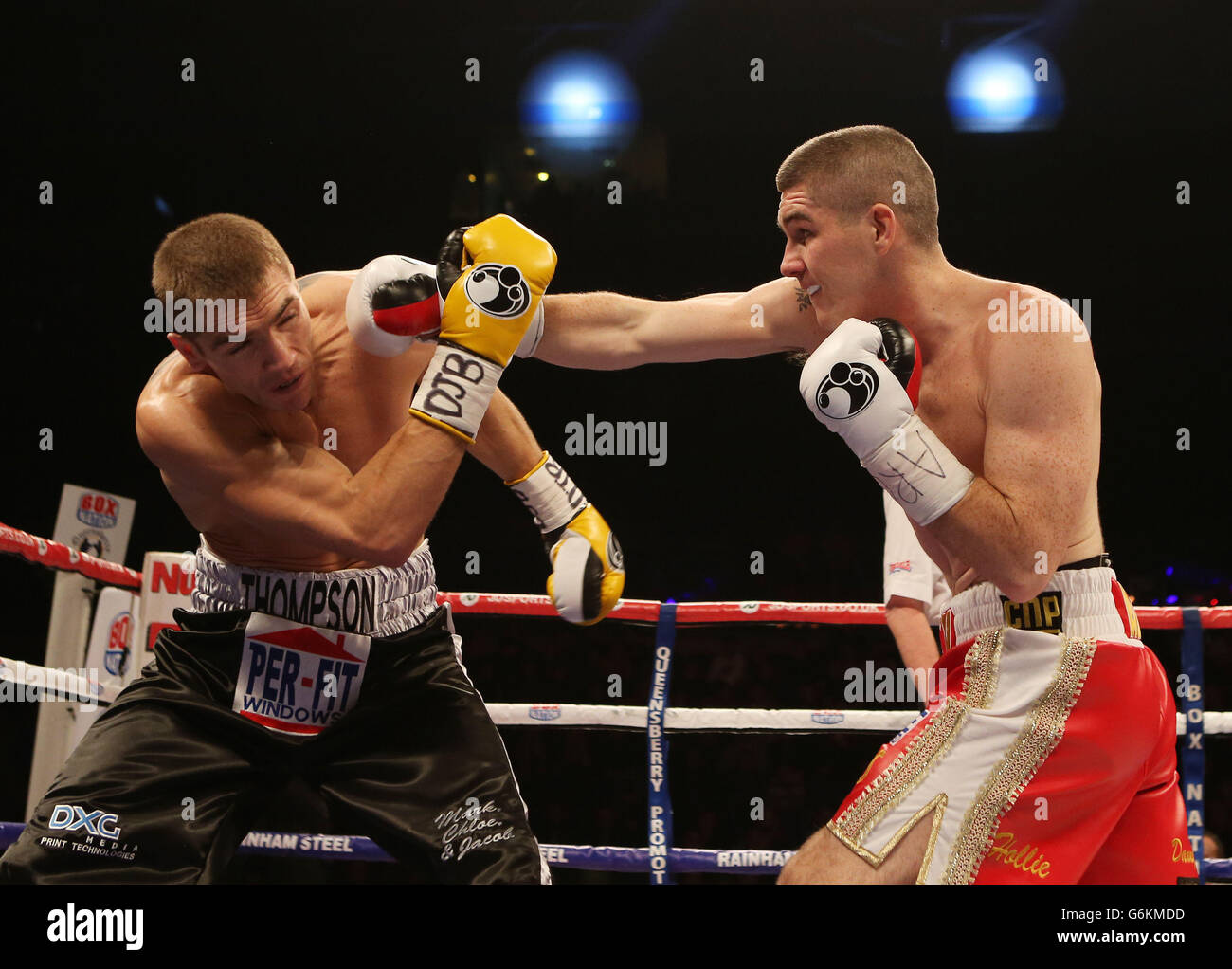 Liam Smith and Mark Thompson (left) during The British Light-middleweight Championship bout at the Echo Arena, Liverpool. Stock Photo