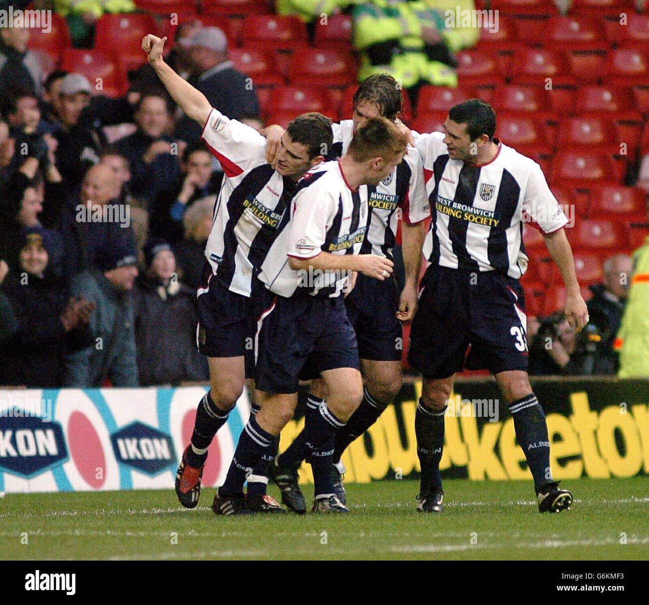 West Bromwich Albion's Jason Koumas (L) celebrates scoring against Nottingham Forest with team mates during the Nationwide Division One match at The City Ground, Nottingham, Saturday, November 29, 2003. NO UNOFFICIAL CLUB WEBSITE USE. Stock Photo