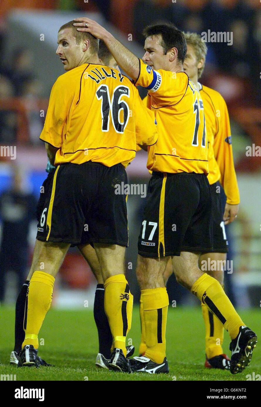 Livingston's Derek Lilley (left) celebrates with teammates after scoring against Aberdeen, during their CIS Insurance Cup quarter-final match at the Pittodrie Stadium, Aberdeen. NO UNOFFICIAL CLUB WEBSITE USE. Stock Photo