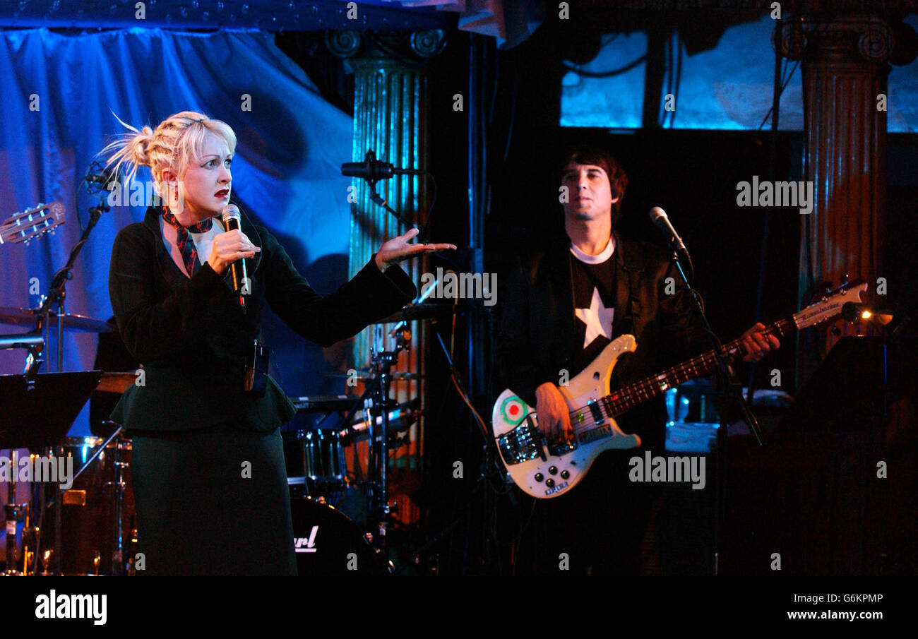 Singer Cyndi Lauper performs songs during a showcase for her latest