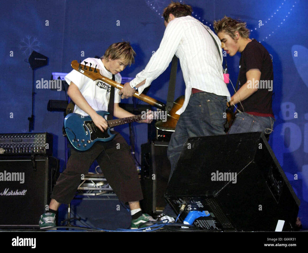 Busted performing on stage during Capital FM's Christmas Live music ...