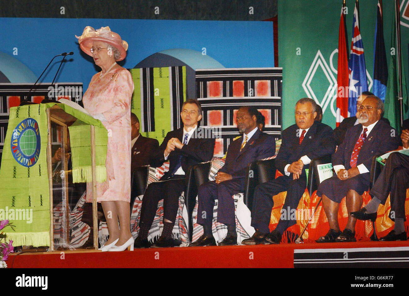 Britains Queen Elizabeth II makes a speech to officially open this year's Commonwealth Heads of Government Meeting in Abuja, Nigeria. Disagreement over whether to reinstate Zimbabwe threatened to split rich Western and poor African countries as a 52-nation Commonwealth summit opened ' without a 53rd member, Robert Mugabe's Zimbabwe. Stock Photo