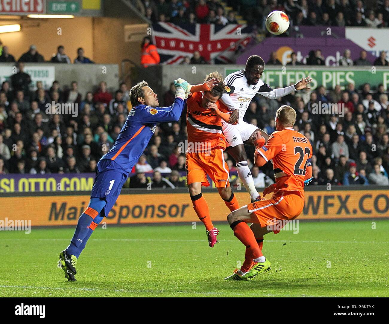 Valencia's goalkeeper Carreira Diego Alves (left) and Jeremy Mathieu ...