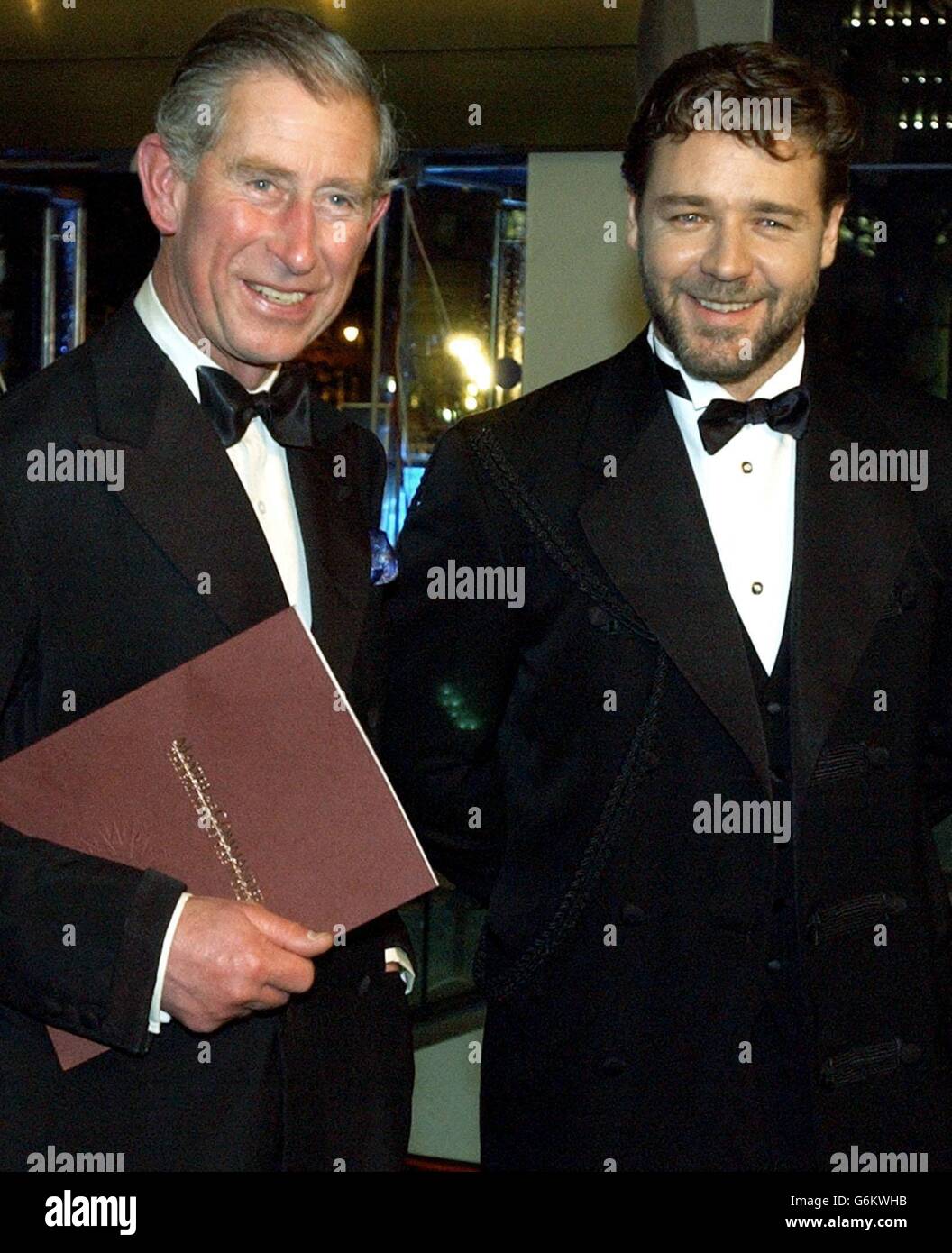 The Prince of Wales (left) with Australian actor Russell Crowe at the Royal Premiere of 'Master and Commander: The Far Side of the World' screened at the Odeon in London's Leicester Square. Stock Photo