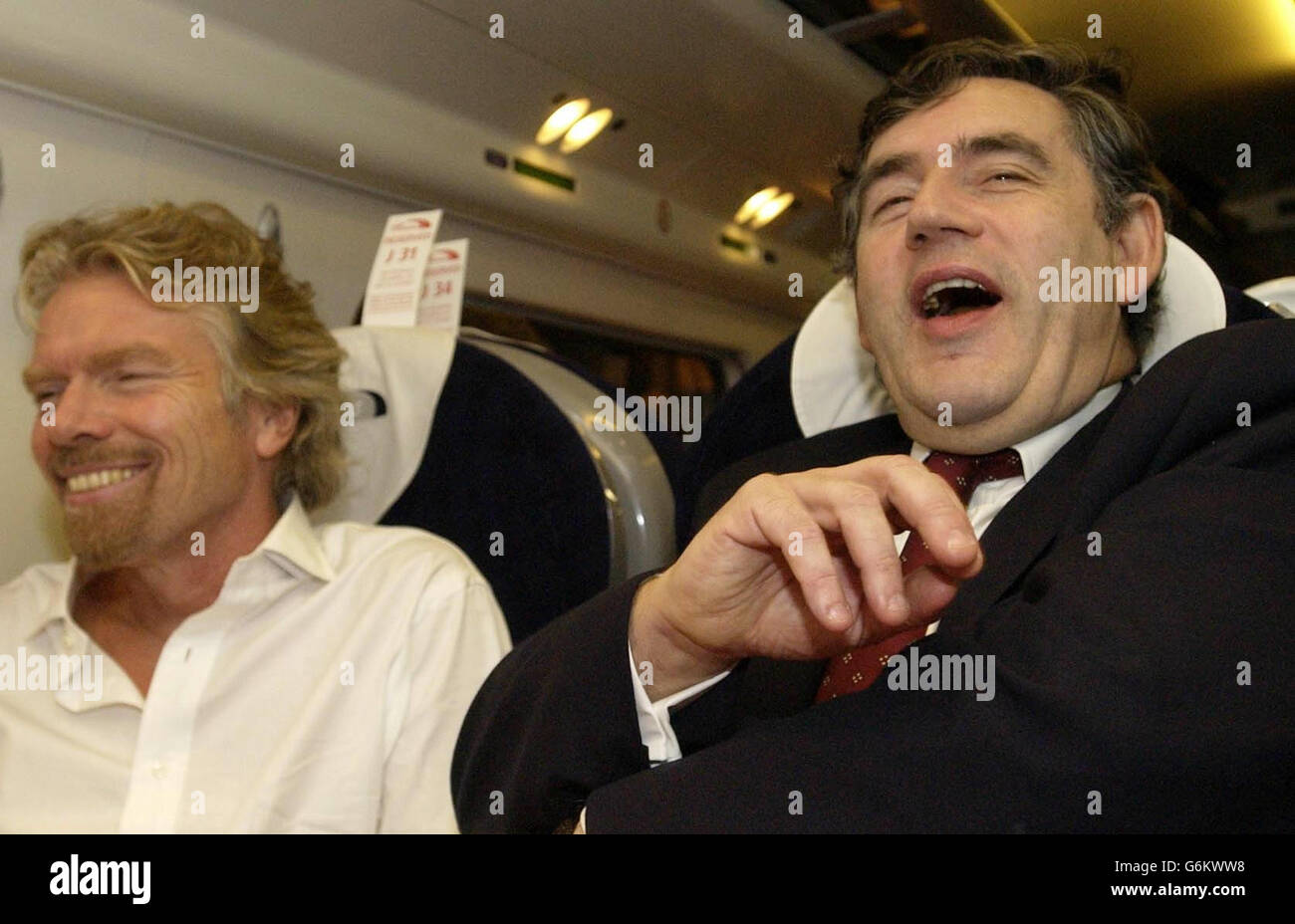 Chancellor gordon brown right talks with virgin tycoon richard branson