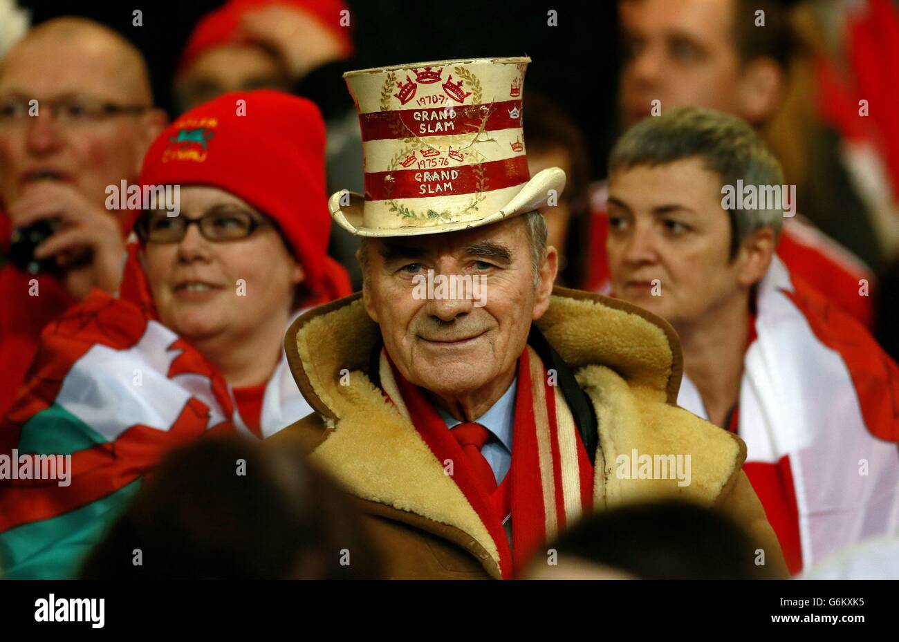 A Wales fan with a vintage Welsh Rugby top hat in the crowd during the Dove Men Series at the Millennium Stadium, Cardiff. Stock Photo