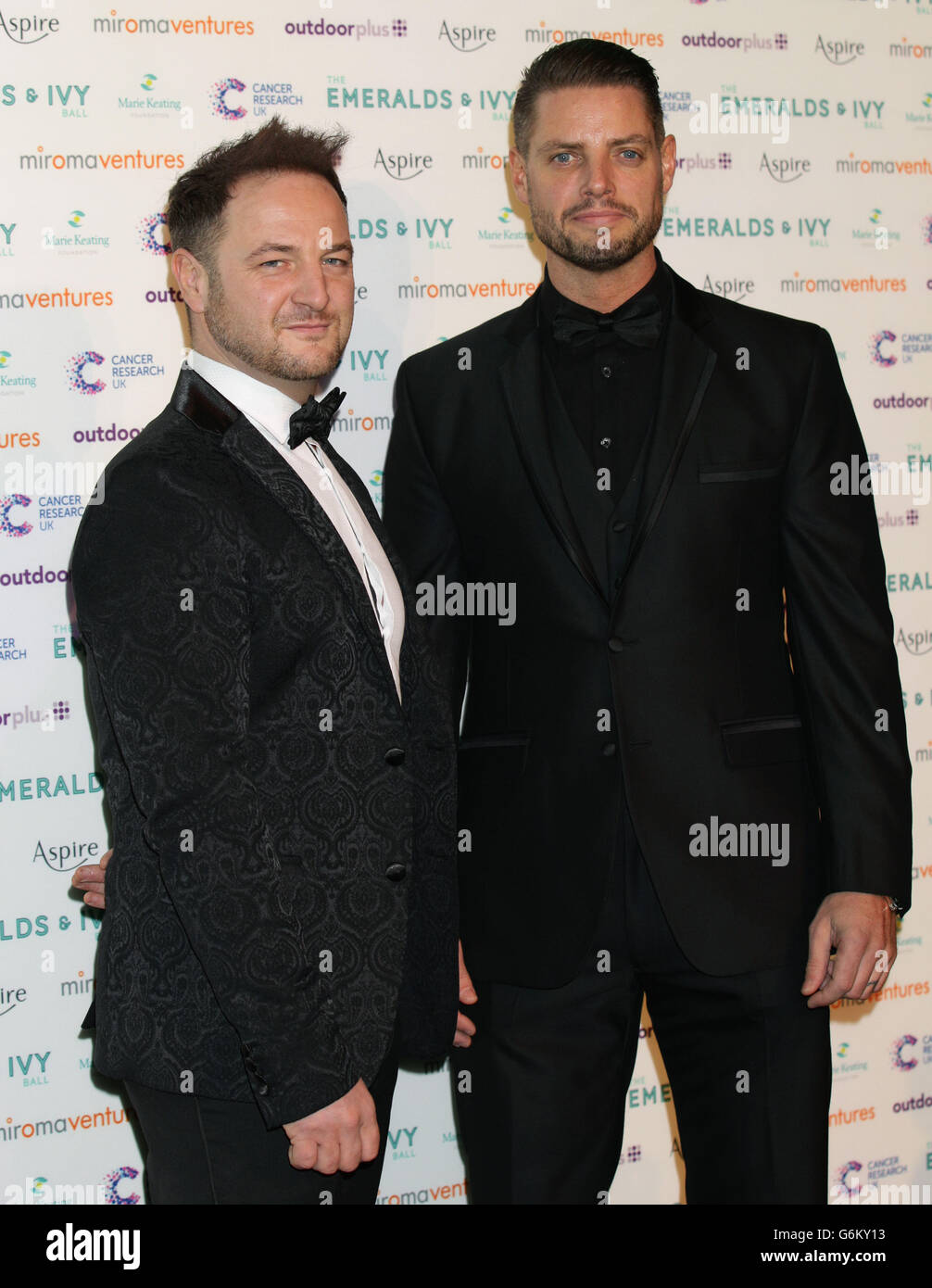 Boyzone members Mikey Graham and Keith Duffy attending the Emeralds and Ivy Ball - which raises funds for Cancer Research UK and the Marie Keating Foundation - at Old Billingsgate in London. Stock Photo