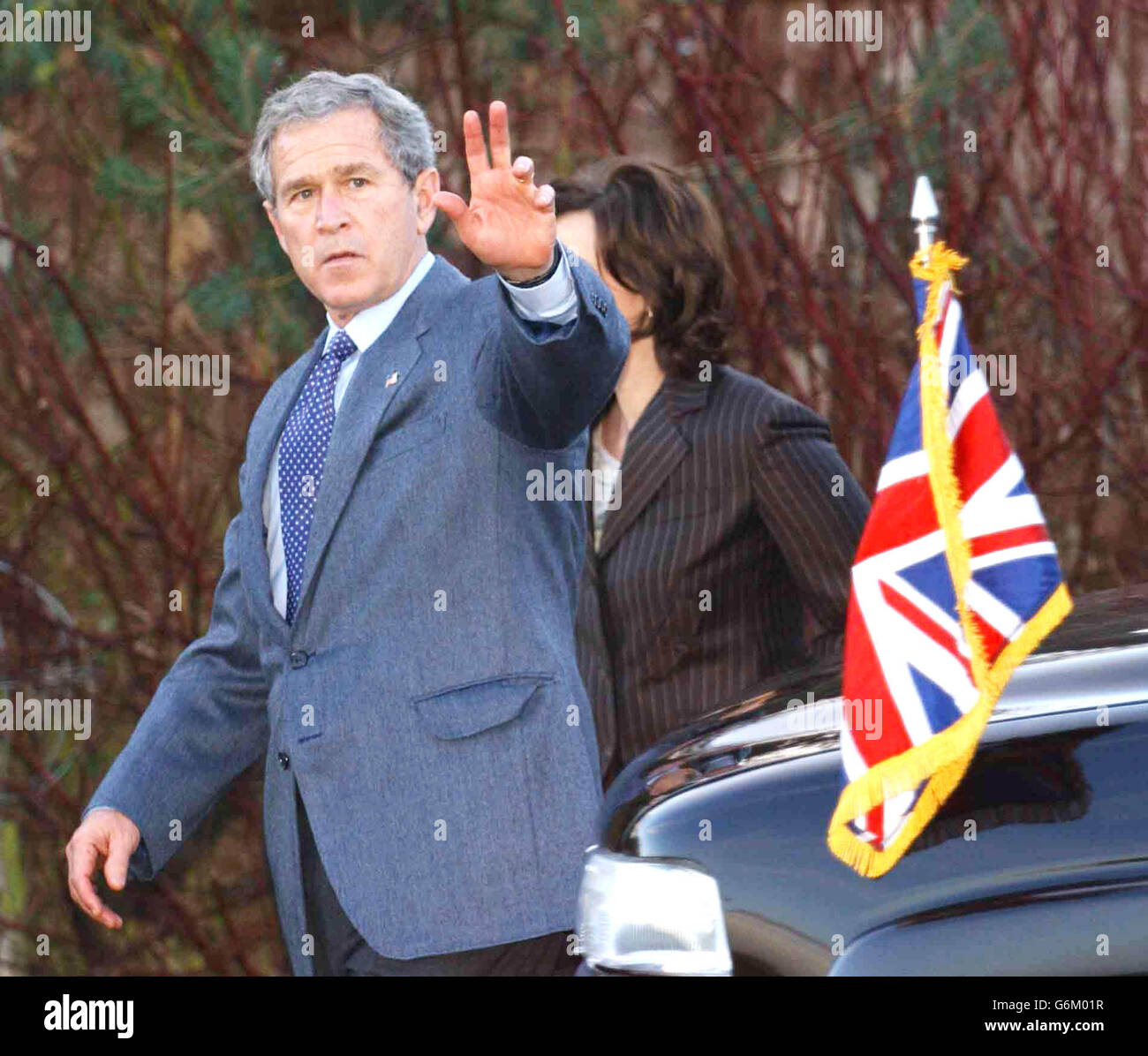 US President George W Bush waves to the crowds as he leaves British Prime Minister Tony Blair constituency home in Sedgefield in County Durham. * It was understood that the trip was designed to offer the chance for the Mr Blair and President Bush to spend time together in more relaxed conditions, following the high-profile speeches, political discussions and pageantry of the past two days. Stock Photo