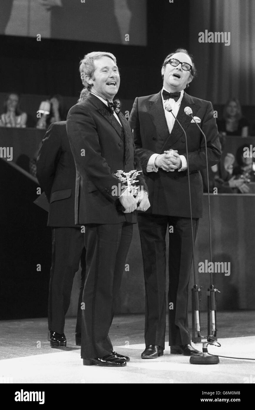 Eric Morecambe (r) and comedy partner Eric Wise at the Society of Film and Television Arts Limited Annual Awards presentation dinner in London, where they received from the society's president, Princess Anne, the award for the Best Light Entertainment Performance for The morecambe and Wise television show. Stock Photo