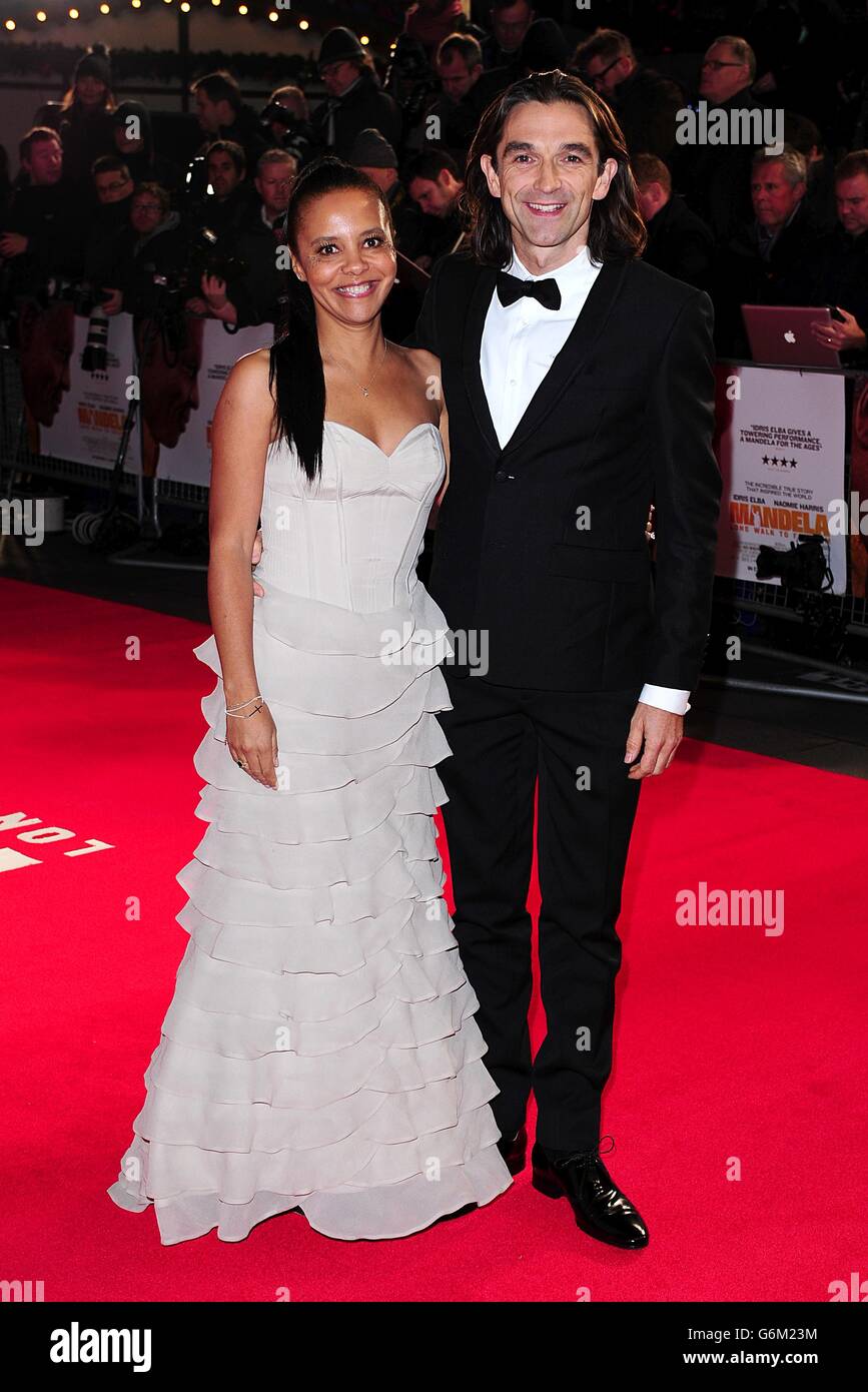 Director Justin Chadwick and his wife Michelle arriving for the Royal Film Performance of Mandela: Long Walk to Freedom, at the Odeon Leicester Square, London. Stock Photo
