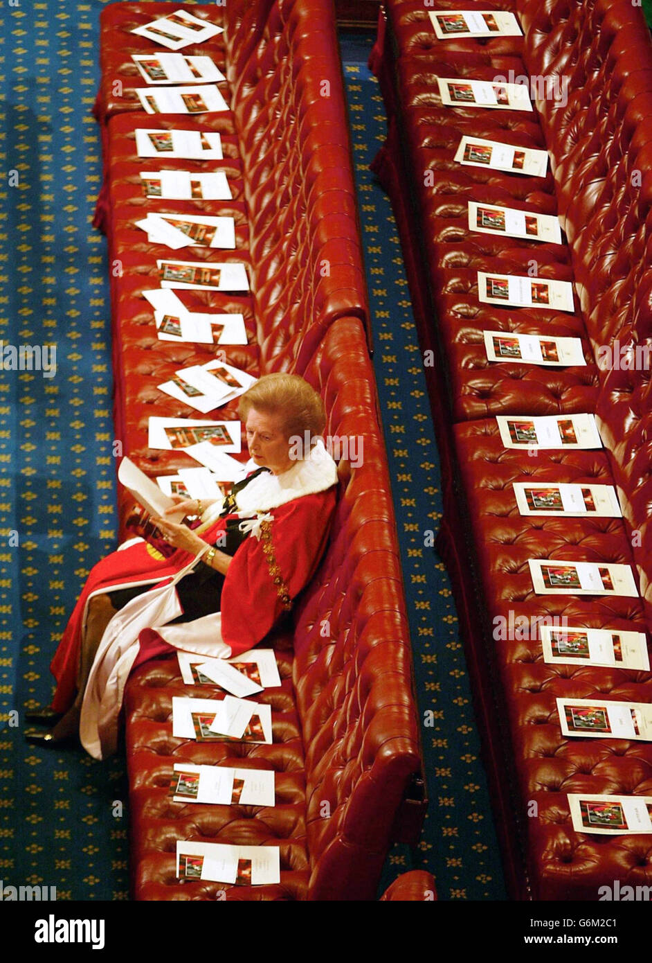 Britain's former Prime Minister Baroness Thatcher sits alone as she waits for the start of the State Opening of Parliament at the Palace of Westminster in London. Stock Photo