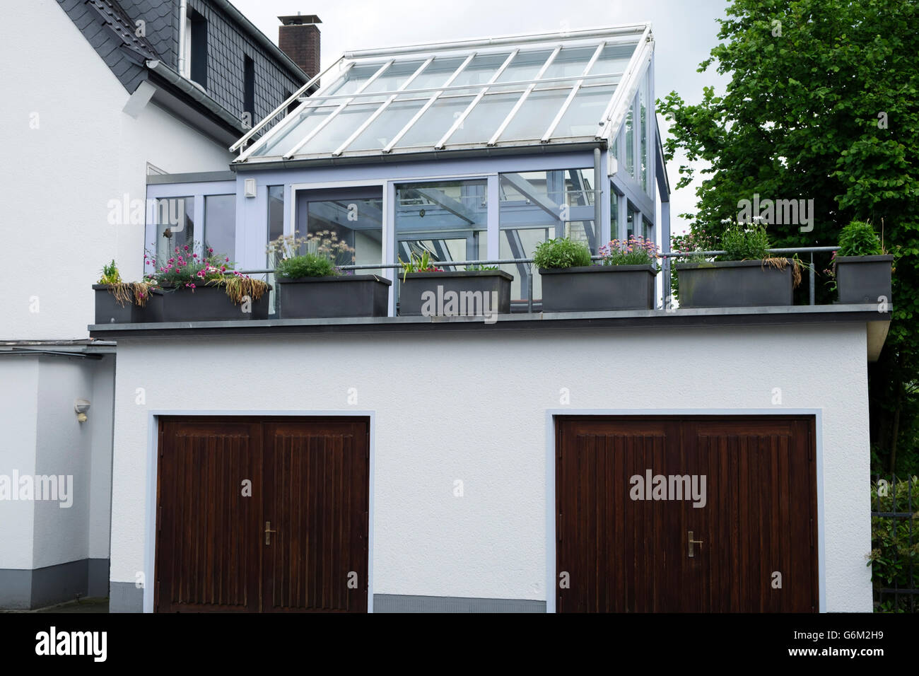 Wooden house conservatory hi-res stock photography and images - Alamy