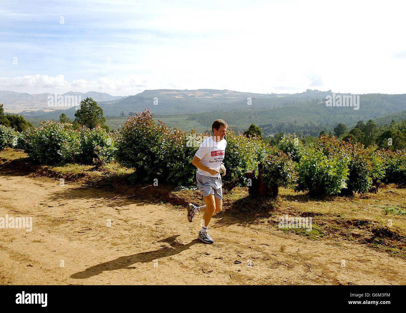 Former Downing Street Director of Communications Alistair Campbell during a training run in the hills above Addis Ababa, before the Great Ethiopian Run 2003 in Addis Ababa tomorrow. Campbell is taking part in the gruelling 10km race, which is run at an altitude of 7,500 feet, to raise funds for his favourite charity Leukaemia Research. Stock Photo