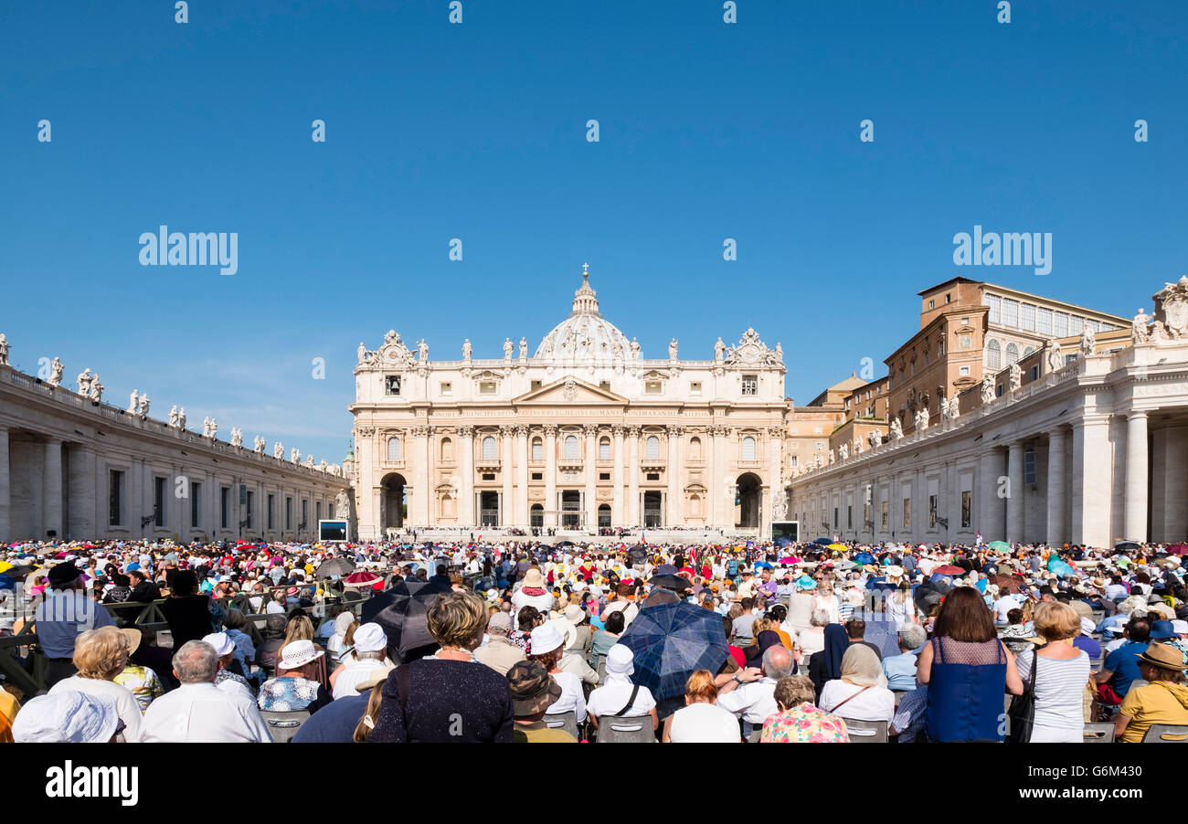 View of St Peters Basilica during general audience with the Pope in St Peter's Square in Vatican City Rome , Italy Stock Photo