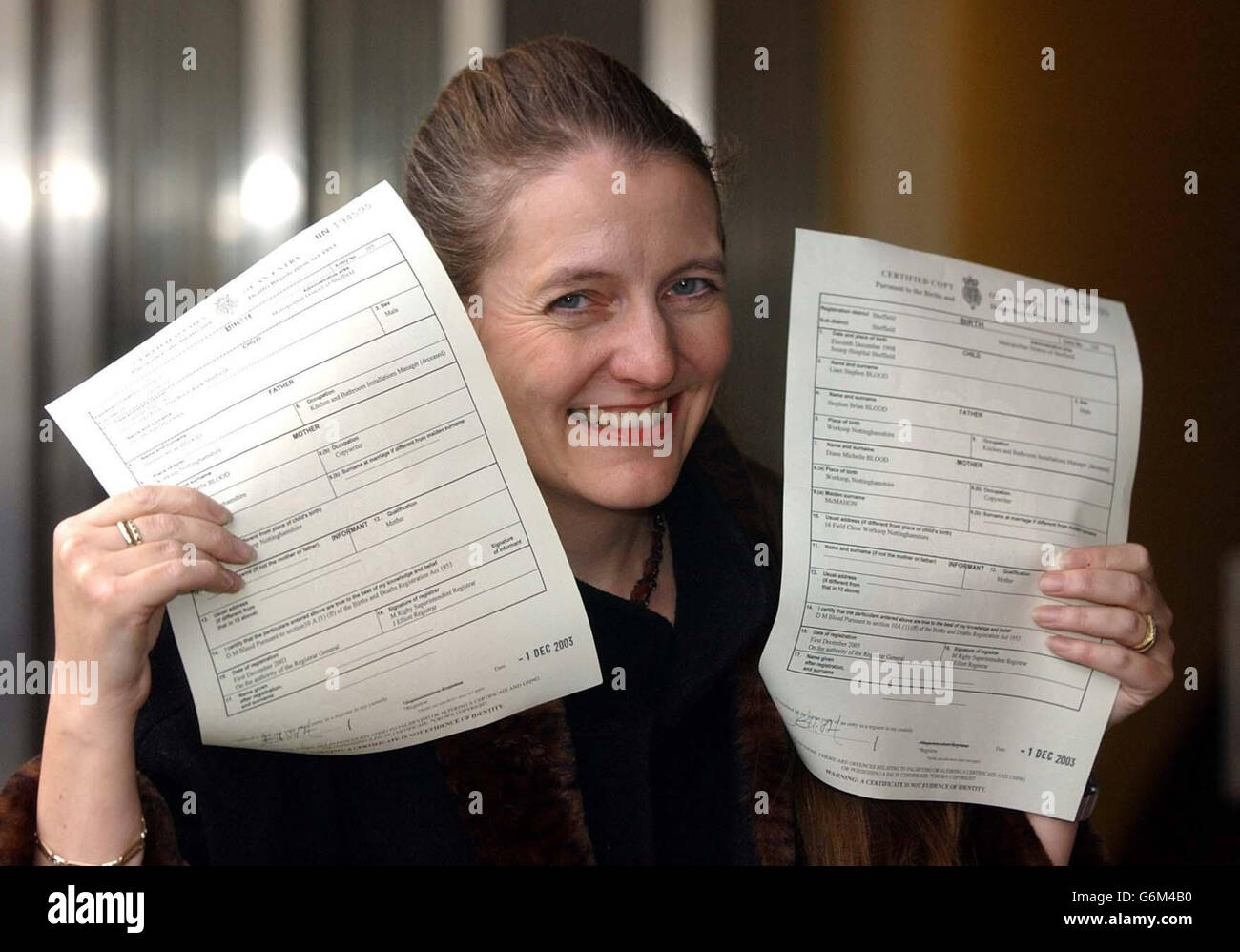 Diane Blood shows birth certificates for sons Liam and Joel, bearing the name of their father, at Sheffield District Register Office, after Mrs Blood won her long legal battle to have her late partner Stephen, who died in 1995, legally recognised on the documents.The Human Fertilisation and Embryology (Deceased Fathers) Act 2003, which came into force today, gives mothers like Mrs Blood, whose children were conceived after their fathers' deaths, a six-month window in which to re-register their children's births if they now wish to name the deceased parent on the relevant birth certificate. Stock Photo