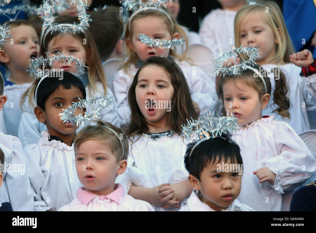 Mollly Daly (girl yawning) from St Josephs Nursery school during the opening of the Irish Farmers Association Live Animal Crib at the Mansion House in Dublin. Stock Photo