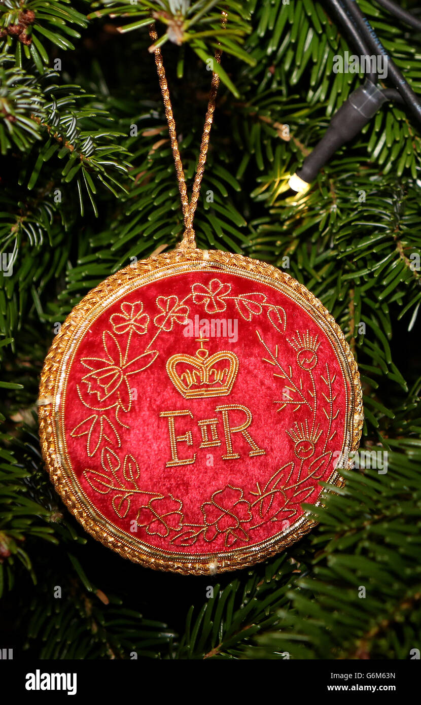 A bauble hung on a Christmas tree by Queen Elizabeth II during a visit to  open the new Barnardo's Head Quarters in Ilford, east London Stock Photo -  Alamy
