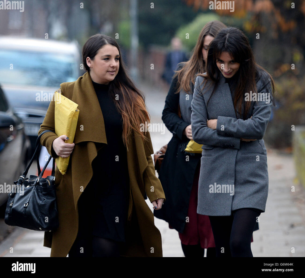 Anzelle Wasserman (left) arrives with an unidentified women at Isleworth Crown Court in London, to give evidence in the trial of sisters Elisabetta 'Lisa' and Francesca Grillo, the former personal assistants to Charles Saatchi and Nigella Lawson. RESS ASSOCIATION Photo. Picture date: Tuesday December 10, 2013. The sisters are accused of committing fraud by abusing their positions by using a company credit card for personal gain. See PA story COURTS Saatchi. Photo credit should read: Andrew Matthews/PA Wire Stock Photo