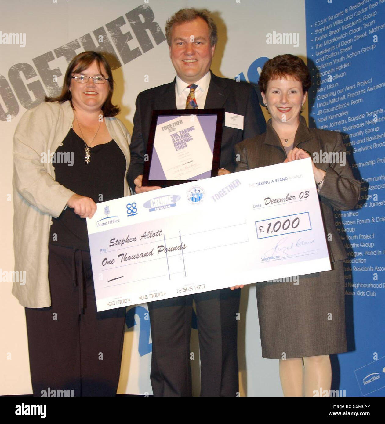 Taking a Stand Awards at the House of Commons. Stephen Allott of Clapham, London, receives his award from Director of Anti-Social Behaviour at the Home Office, Louise Casey (left) and Home Office Minister Hazel Blears. Stock Photo