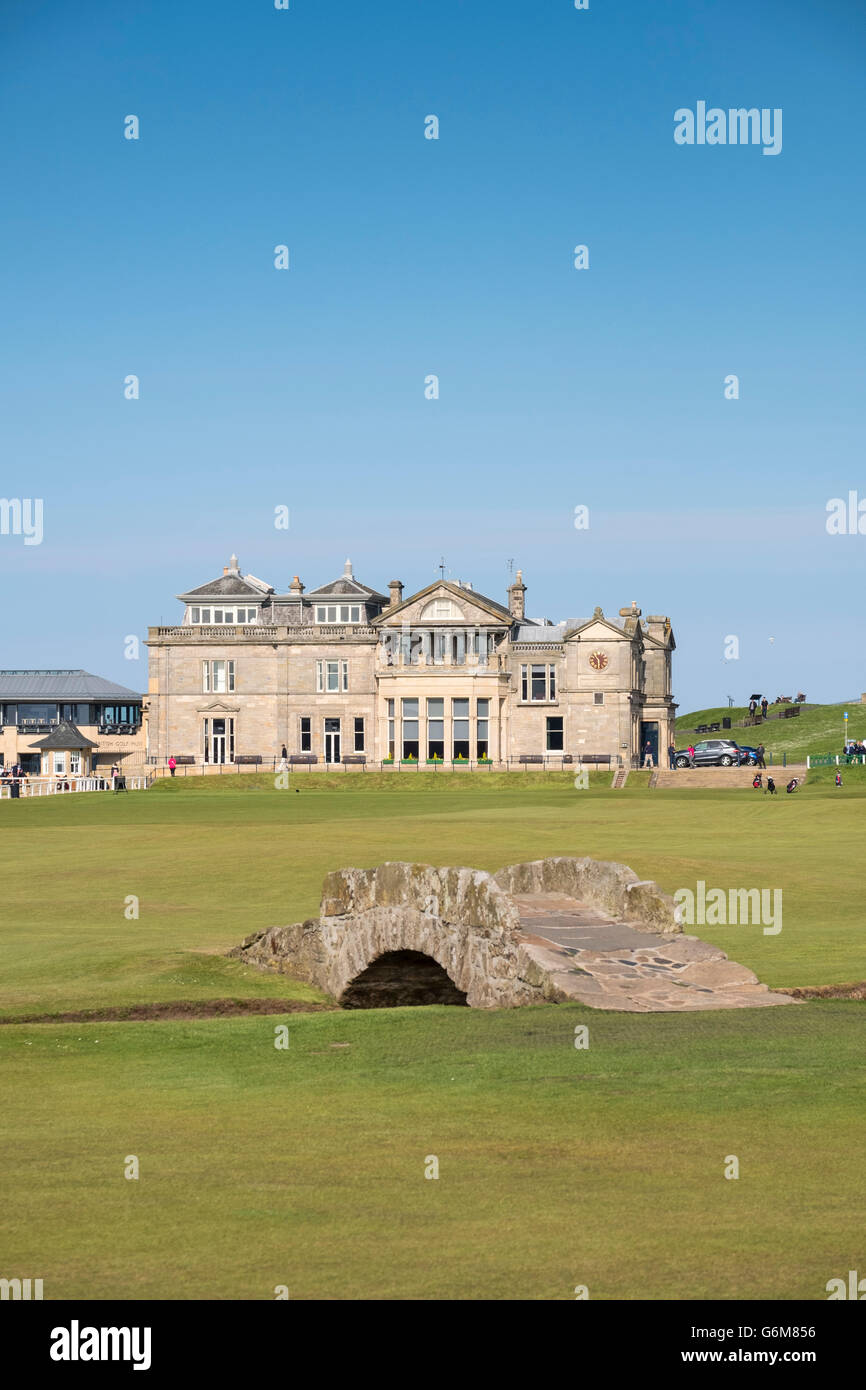 View of Clubhouse and Swilken Burn Bridge on fairway of 18th hole at Old Course in St Andrews in Fife , Scotland, United Kingdom Stock Photo