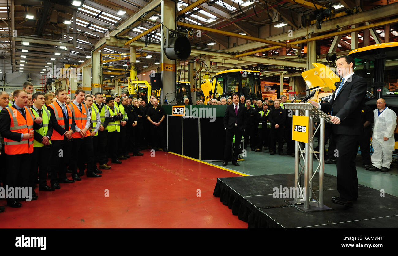 The Chancellor of the Exchequer George Osborne speaks to JCB staff during a visit to JCB's backhoe loader factory in Rocester, Staffordshire. JCB announced today plans to invest &pound;150 million to expand its operations in Staffordshire and create an additional 2.500 jobs by 2018. Stock Photo