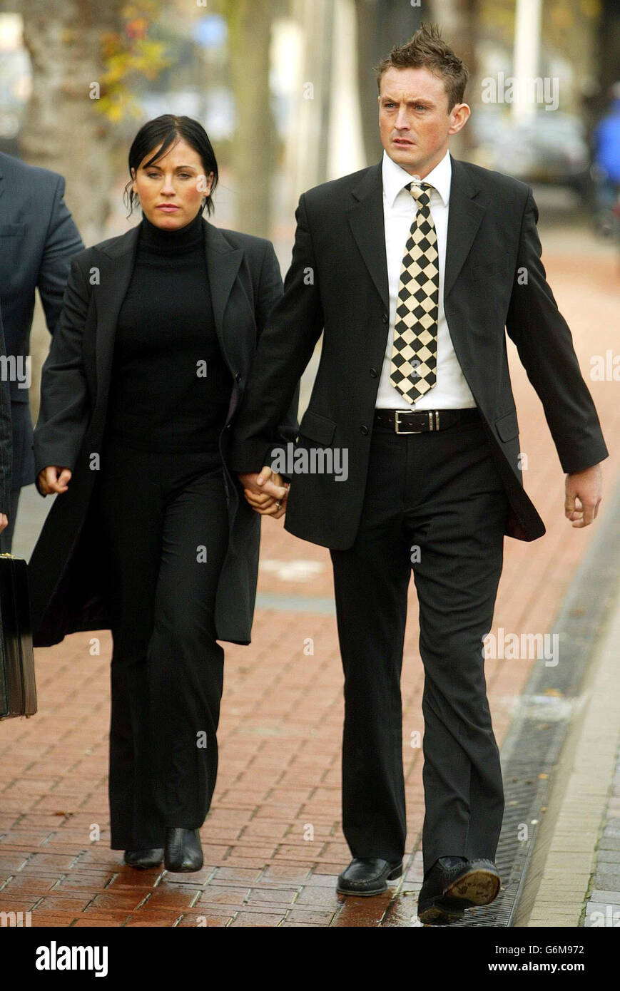 EastEnders actress Jessie Wallace, real name Karen Wallace accompanied by her boyfriend ex-police officer David Morgan, arriving at Southend magistrates in court accused of drink-driving. Wallace, who is in her early 30's plays the character Kat Slater in the BBC soap EastEnders. Stock Photo