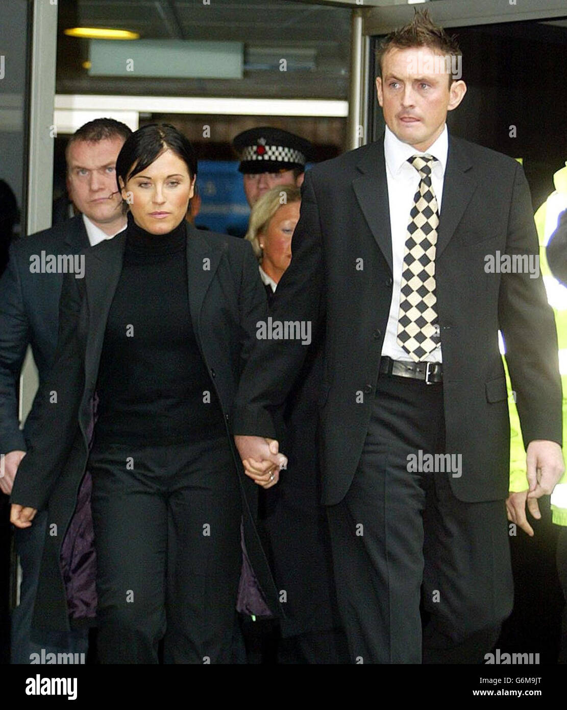 EastEnders actress Jessie Wallace, real name Karen Wallace accompanied by her boyfriend David Morgan (right), leaves Southend Magistrates Court after admitting drink driving. Wallace, who plays the character Kat Slater in the BBC soap, was banned from driving for three years and fined 1,000 after failing a breath test in March. Stock Photo