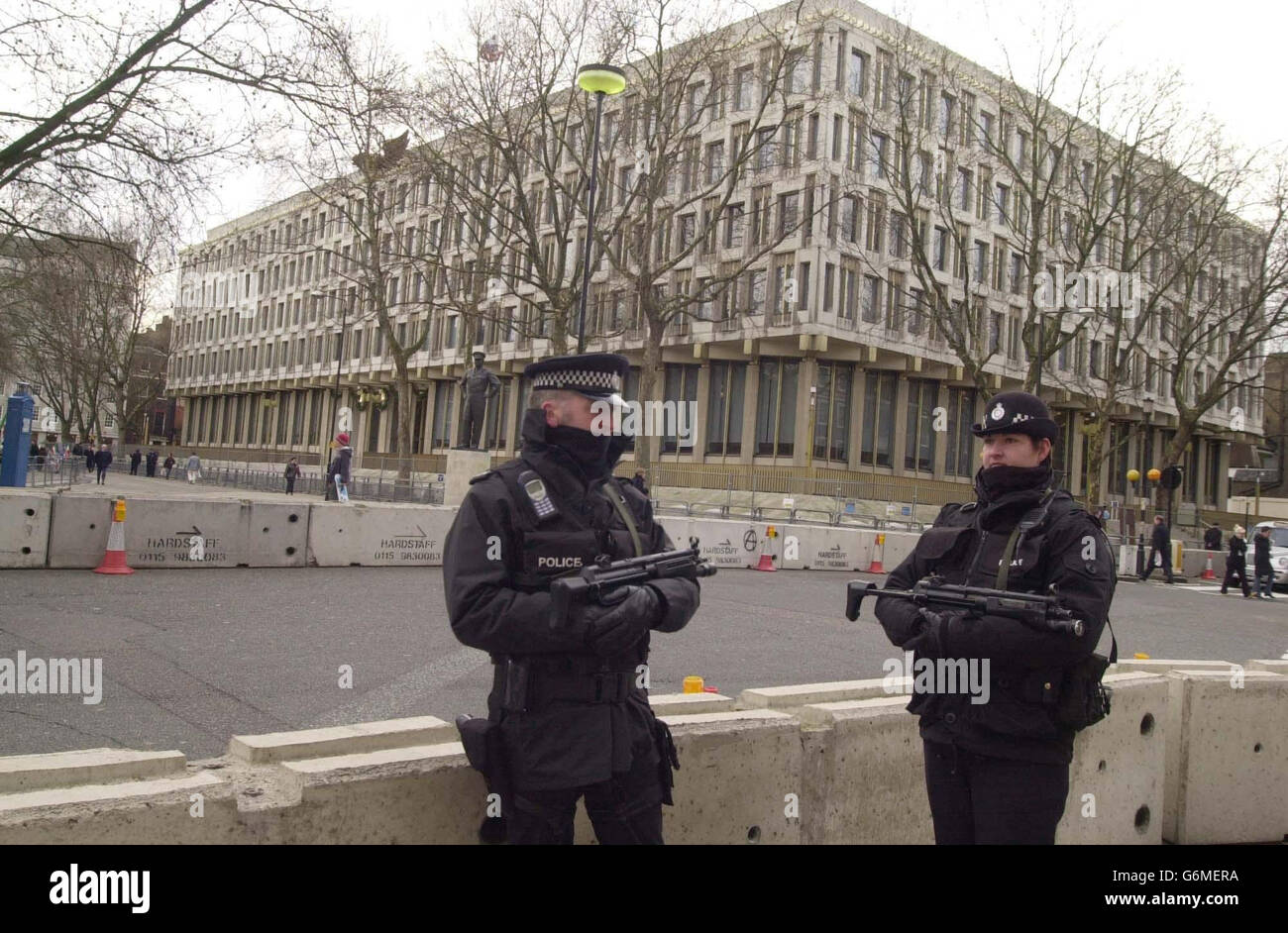 Armed police guard the US Embassy Stock Photo