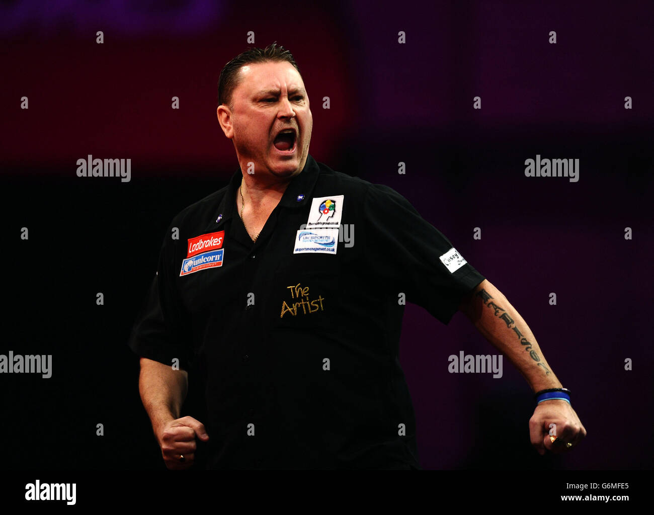 Kevin Painter celebrates winning the first set during day ten of The