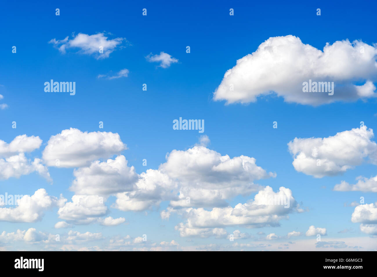 White Cumulus Clouds On Blue Sky Stock Photo - Alamy