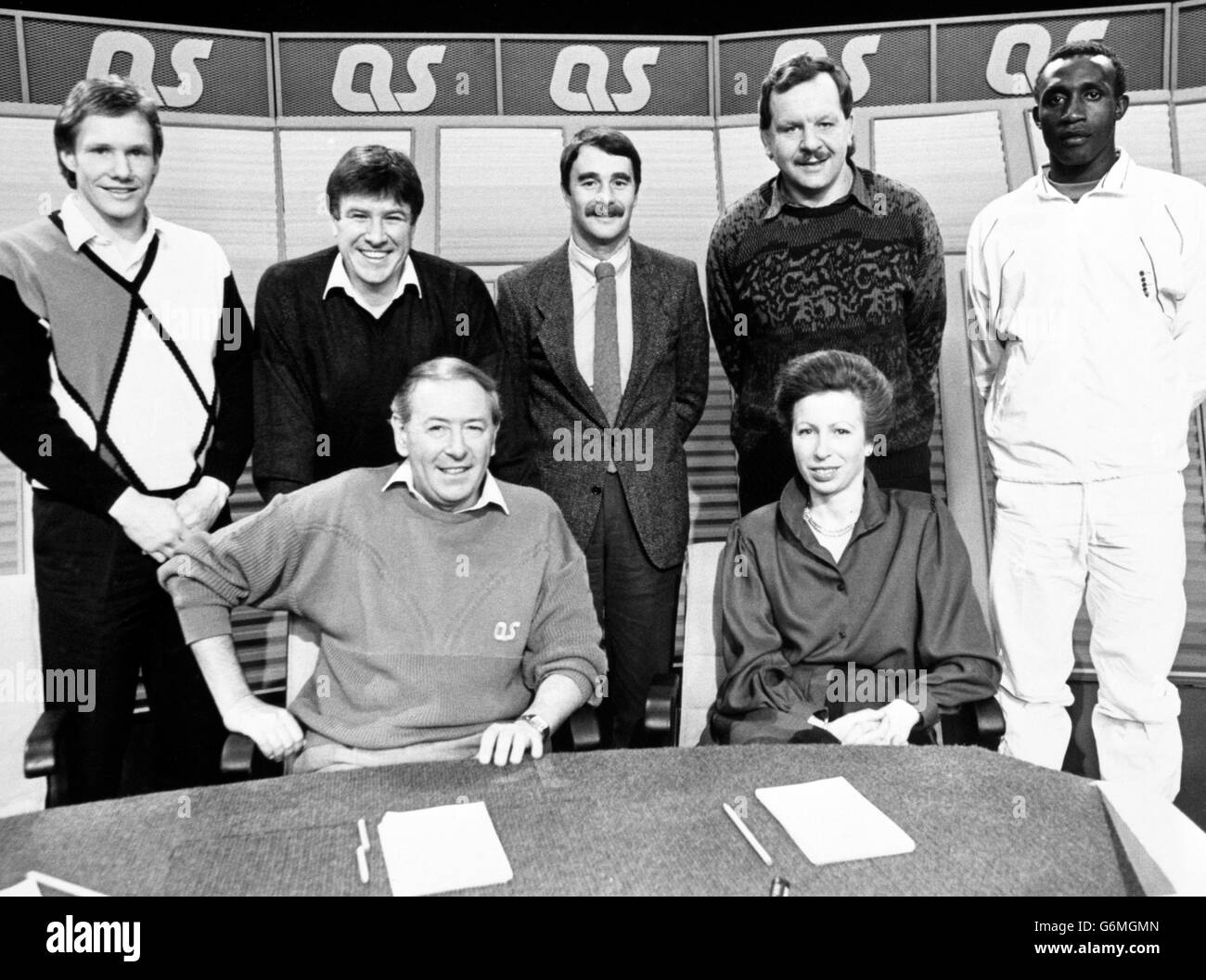 Princess Anne sits with presenter David Coleman at the recording of the 200th episode of A Question of Sport. Her fellow participants were (l-r) John Rutherford, Emlyn Hughes, Nigel Mansell, Bill Beaumont and Linford Christie. Stock Photo