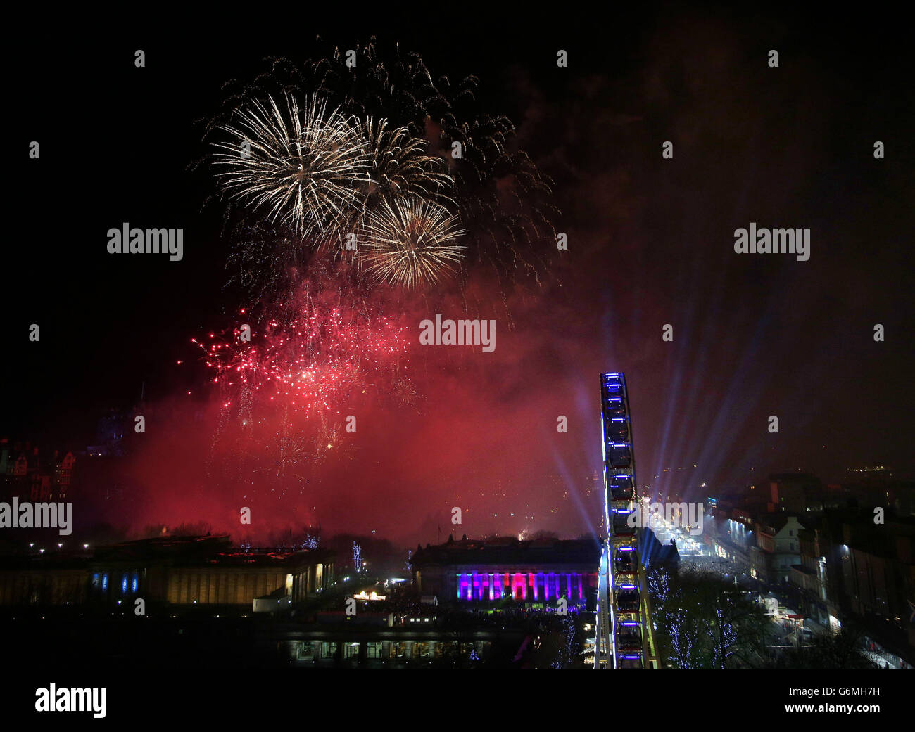 Fireworks light up the sky over Edinburgh Castle during the New Year