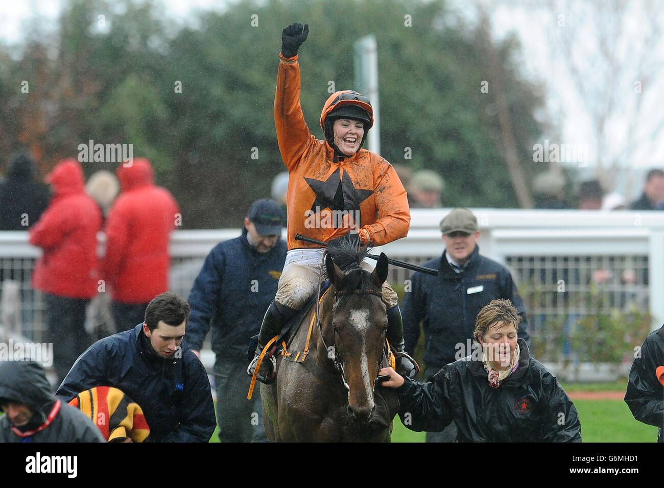 Miss Lizzie Kelly celebrates on Aubusson after winning the Neptune Investment Management Novices' Hurdle at Cheltenham Racecourse. Stock Photo