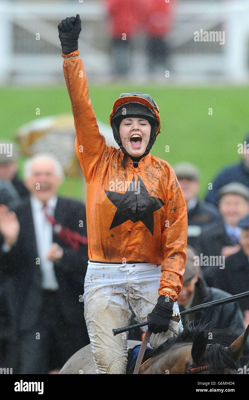 Miss Lizzie Kelly celebrates on Aubusson after winning the Neptune