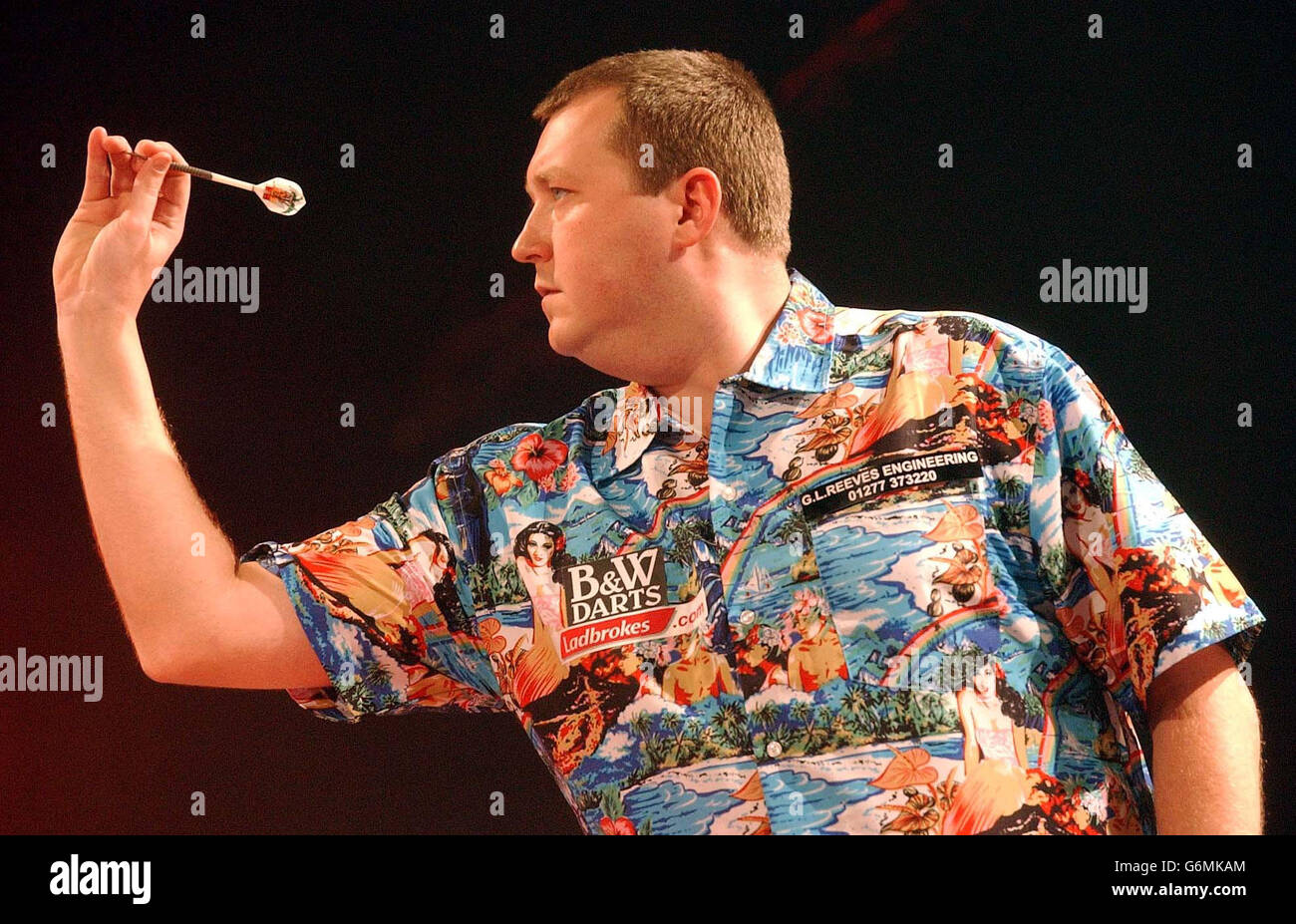 Darts - PDC World Championship - Circus Tavern, Essex - Final - 04/01/04  Compere Phil Jones with the oche girls Mandatory Credit : Action Images /  Lee Mills Stock Photo - Alamy