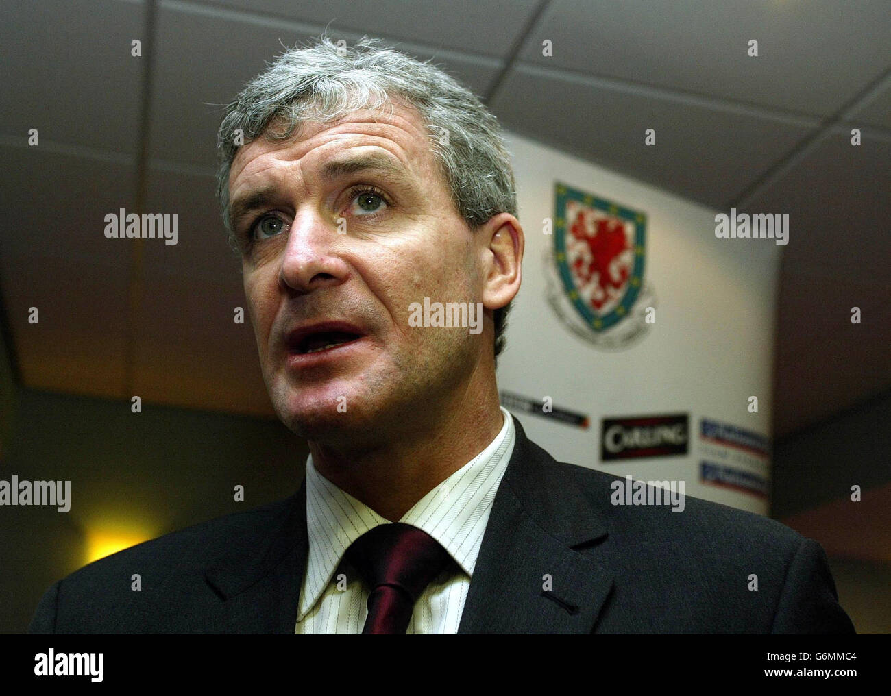 Wales' Coach Mark Hughes attends the fixtures press conference for the
