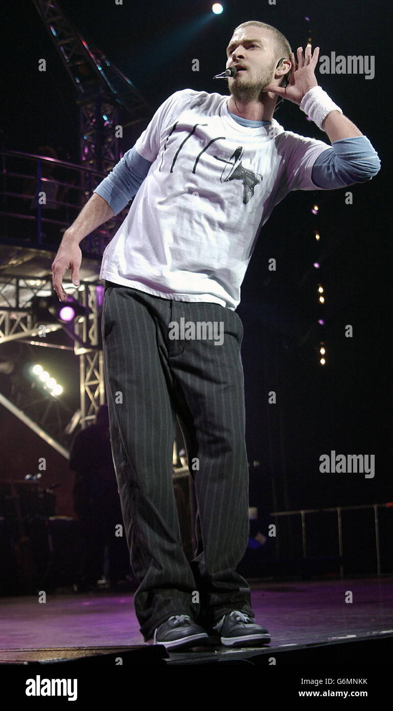 NO MERCHANDISING: Justin Timberlake performs on stage at Earl's Court in London during his second stadium tour of the year. Stock Photo