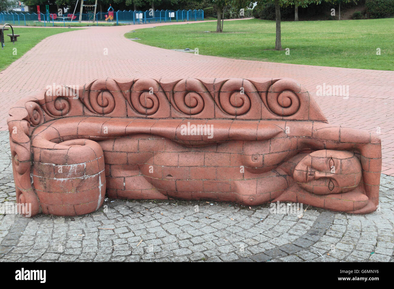 'Female Beastie Bench' by Gwen Heeney, one of a series of nine Beastie Benches in brick, Cardiff Bay, Glamorgan, Wales. Stock Photo