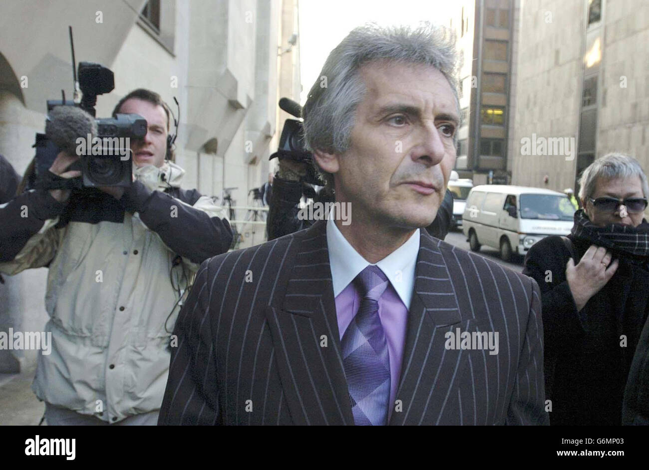 Property baron Nicholas van Hoogstraten arrives at the Old Bailey, London, to be formally cleared after winning a legal battle to clear his name following his conviction for killing a business rival. * Hoogstraten, who walked free from court yesterday amid protests from the dead man's family, had served 12 months of a 10-year sentence after he was convicted of the manslaughter of Mohammed Raja, but won a retrial because of a 'flawed' direction to the jury by the original trial judge. Stock Photo