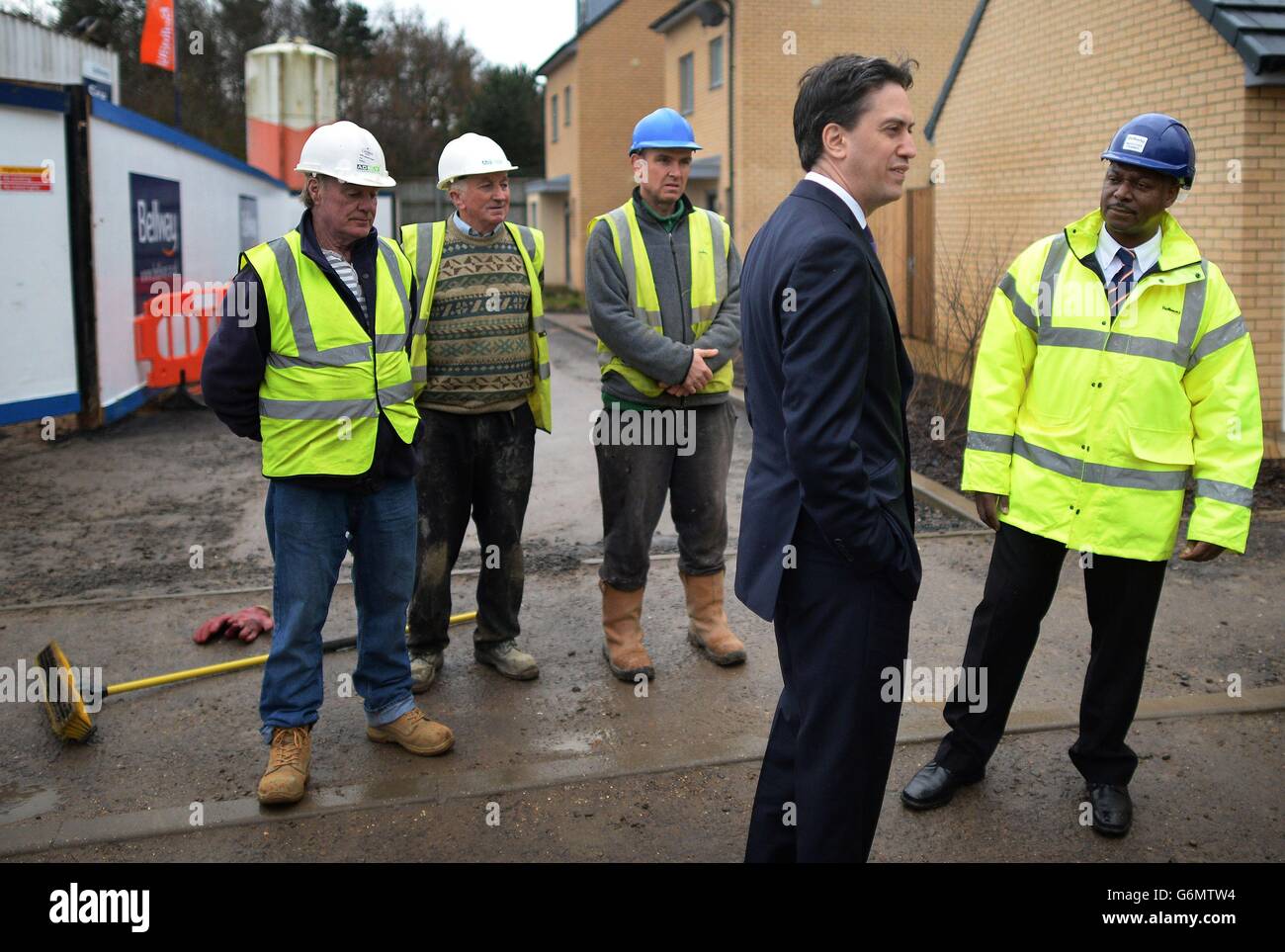 Labour leader Ed Miliband visits Chrysalis Park housing development in Stevenage which is made up of social and private homes where Mr Miliband met a couple who have recently moved into one of the houses and later saw homes still under development and met construction workers. Stock Photo