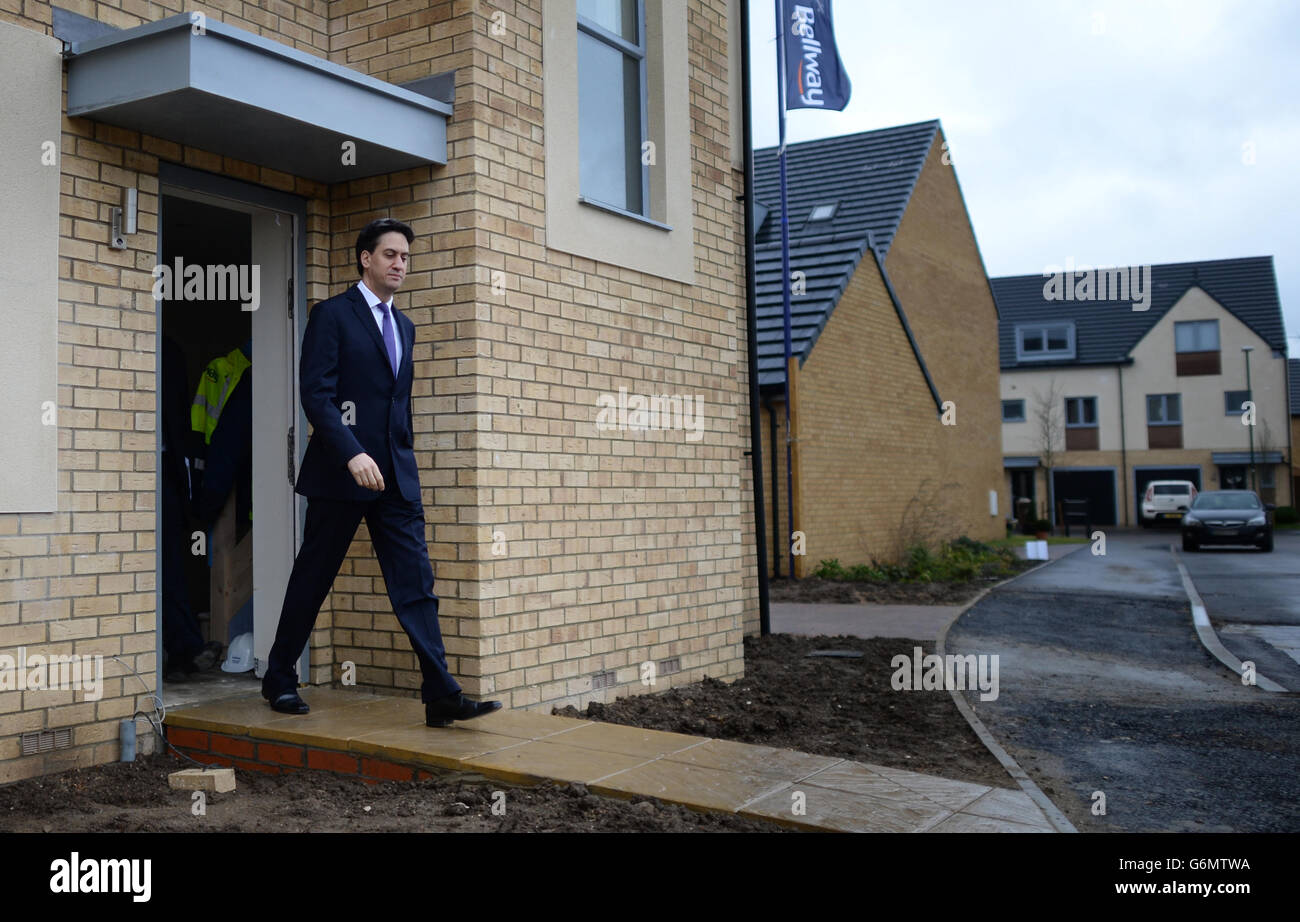 Labour leader Ed Miliband visits Chrysalis Park housing development in Stevenage which is made up of social and private homes where Mr Miliband met a couple who have recently moved into one of the houses, saw homes still under development and met construction workers. Stock Photo