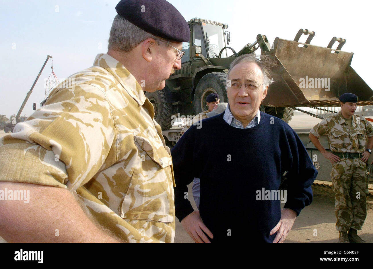 Tory leader Michael Howard (right) meets with British troops during his visit to Shaibah Logistic Base. Mr Howard was joining Armed Forces Minister Adam Ingram and shadow defence secretary Nicholas Soames for the last leg of a tour to raise troops' morale. Stock Photo