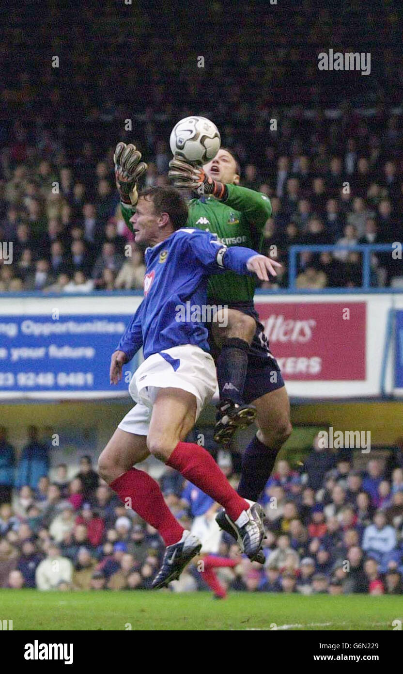 Portsmouth's Teddy Sherringham colides withTottenham Hotspur's Casey Keller, during the FA Barclaycard Premiership match held at Fratton Park, Portsmouth. Stock Photo