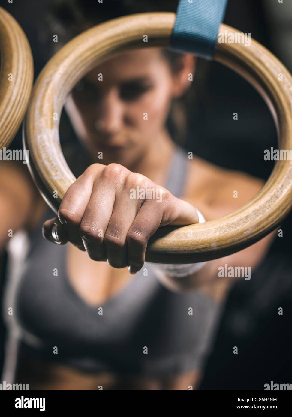 Female athlete, hand on gymnastic ring Stock Photo Alamy