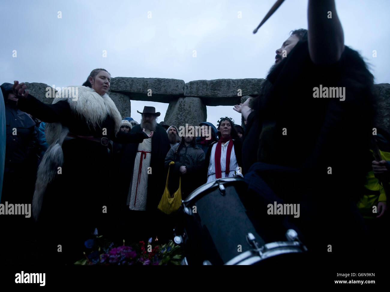 Druids attend the Winter Solstice service at Stonehenge this morning on the shortest day of the year. Stock Photo