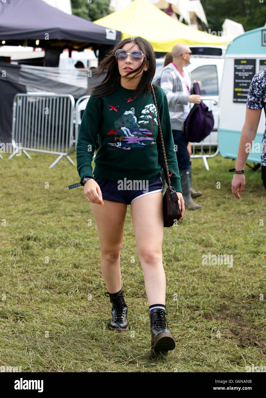 Charli XCX is seen backstage at the Glastonbury Festival, at Worthy